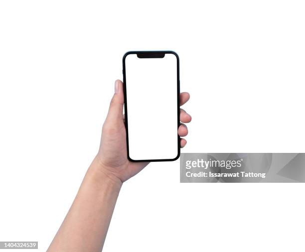 close up hand hold phone isolated on white background - menschliche hand stock-fotos und bilder