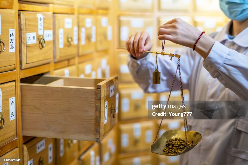 Cabinet for storing herbs in pharmacy