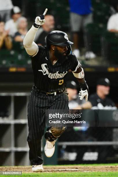 Josh Harrison of the Chicago White Sox hits a walk-off single to win the game 7-6 in the 12th inning against the Toronto Blue Jays at Guaranteed Rate...