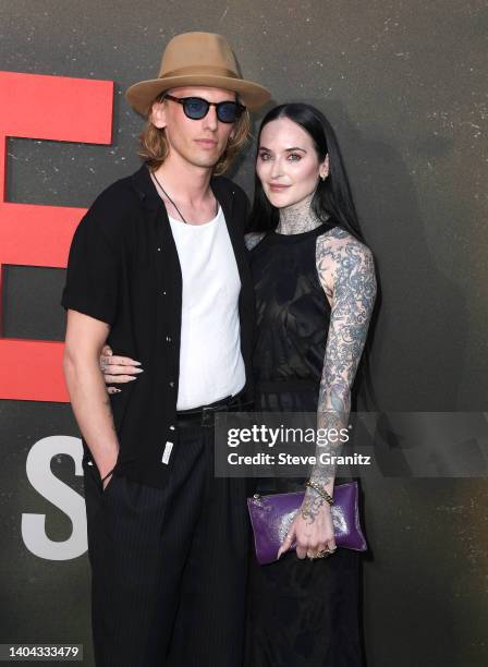 Jamie Campbell Bower arrives at the Universal Pictures' "The Black Phone" Los Angeles Premiere on June 21, 2022 in Hollywood, California.