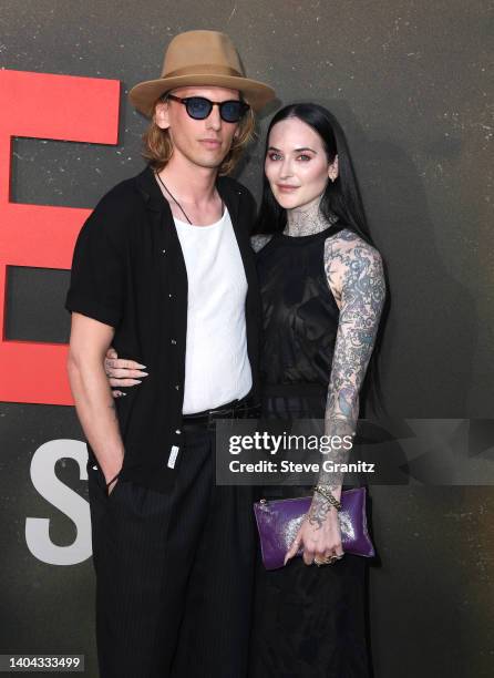 Jamie Campbell Bower arrives at the Universal Pictures' "The Black Phone" Los Angeles Premiere on June 21, 2022 in Hollywood, California.