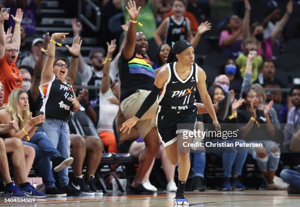 Shey Peddy of the Phoenix Mercury reacts after a three-point shot against the Minnesota Lynx during the first half of the WNBA game at Footprint...
