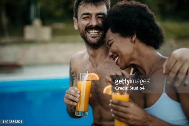 having a best summertime ever - poolside glamour stock pictures, royalty-free photos & images