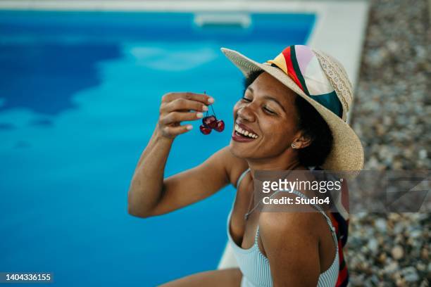 happy - poolside glamour stock pictures, royalty-free photos & images