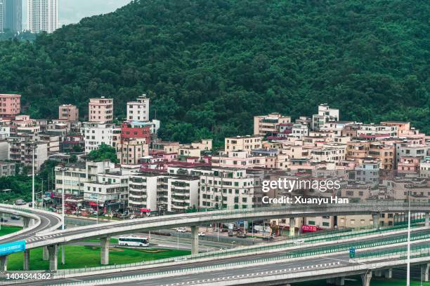 residential area under the mountain - guangdong province stock pictures, royalty-free photos & images