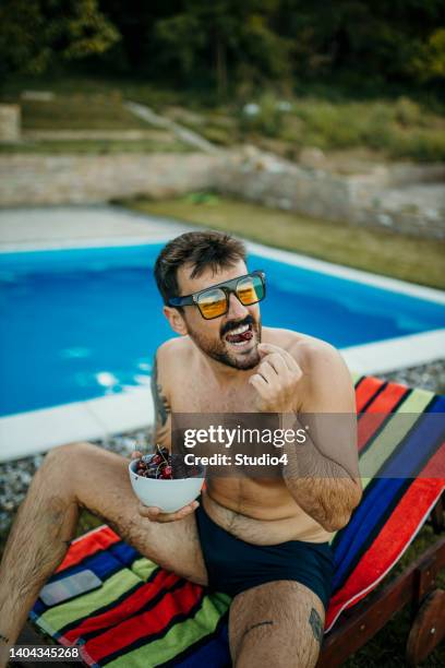 perfect vacation if you ask me - poolside glamour stock pictures, royalty-free photos & images