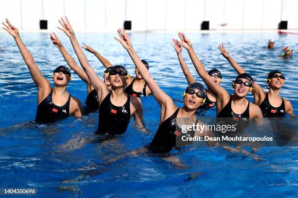 Hao Chang, Yu Feng, Ciyue Wang, Liuyi Wang, Qianyi Wang, Binxuan Xiang, Yanning Xiao, Yayi Zhang of Team China practice in the warm up pool before...