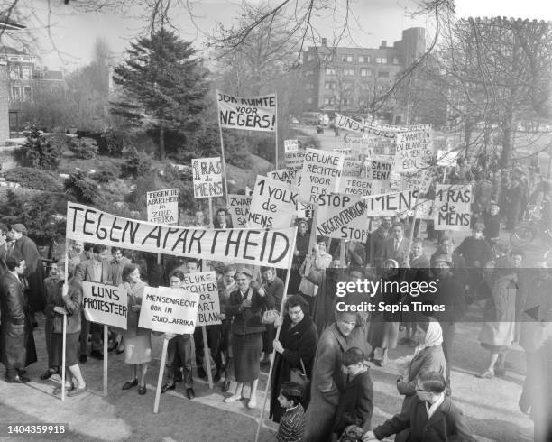 Protest demonstration against apartheid politics of South Africa in The Hague, the procession with banners on the way, April 2, 1960.