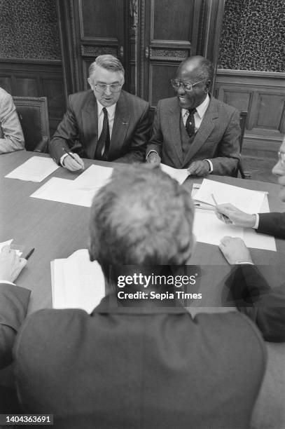 Establishment of African European Institute, J. N. Scholten and D. Mutasa sign, January 21, 1988.