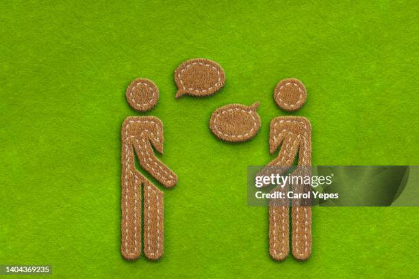 people  talking with bubbles speech in felt.green background - complaining stock illustrations stock pictures, royalty-free photos & images