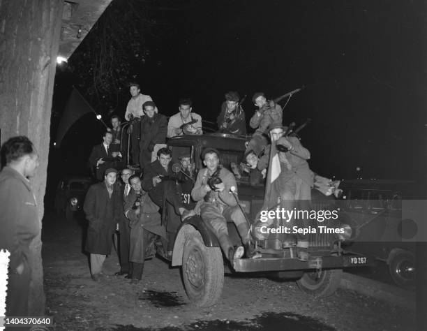 Last photos from Budapest. Resistance fighters with truck on patrol at night, November 2 trucks, The Netherlands, 20th century press agency photo,...