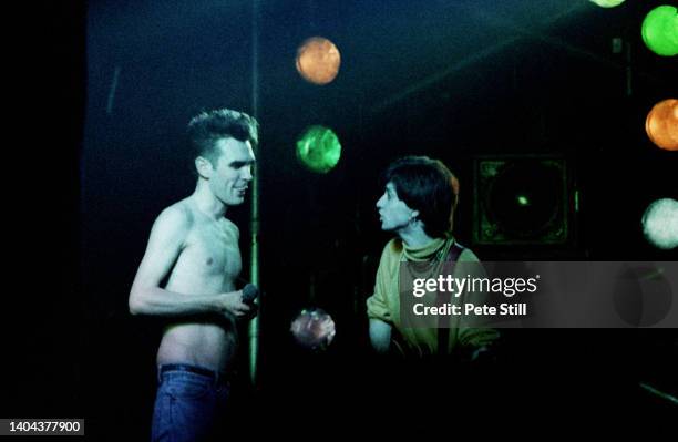 Singer Morrissey and guitarist Johnny Marr of The Smiths perform on stage at Hammersmith Palais, on March 12th, 1984 in London, England.