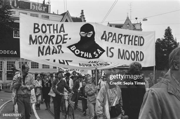 Demonstration against apartheid South Africa in Amsterdam; banner with Apartheid is murder, 8 September 1984, demonstrations, banners, The...