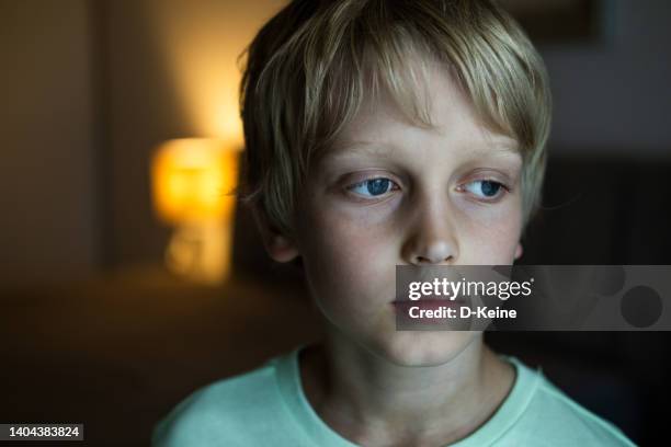 sad boy - sad children only stock pictures, royalty-free photos & images