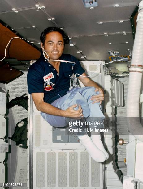 --- Astronaut Robert L. Crippen, pilot for STS-1 takes advantage of zero-gravity to do some rare acrobatics on the middeck of the space shuttle...