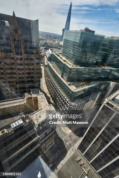 high angle view looking down mincing lane in the city of london england uk. - gherkin shard london stock pictures, royalty-free photos & images