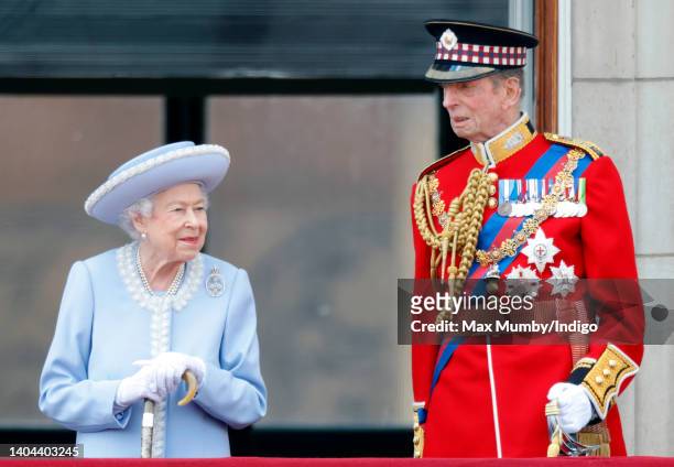 Queen Elizabeth II accompanied by Prince Edward, Duke of Kent takes a salute from the balcony of Buckingham Palace during Trooping the Colour on June...