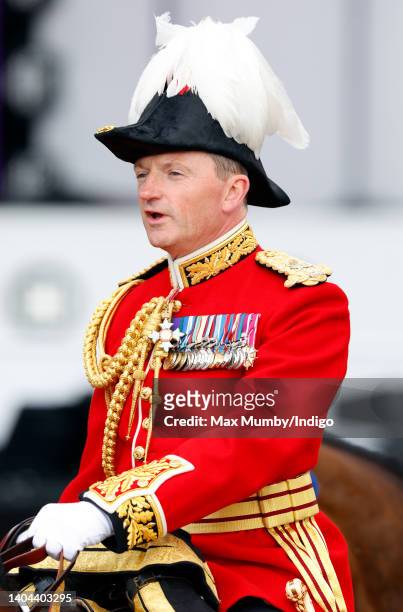Major General Chris Ghika rides down The Mall on horseback during Trooping the Colour on June 2, 2022 in London, England. Trooping The Colour, also...