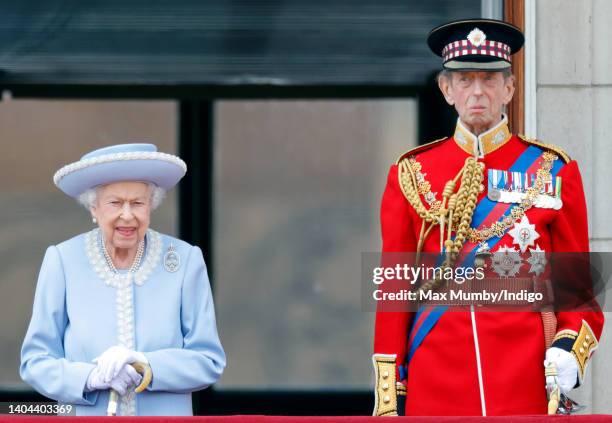 Queen Elizabeth II accompanied by Prince Edward, Duke of Kent takes a salute from the balcony of Buckingham Palace during Trooping the Colour on June...
