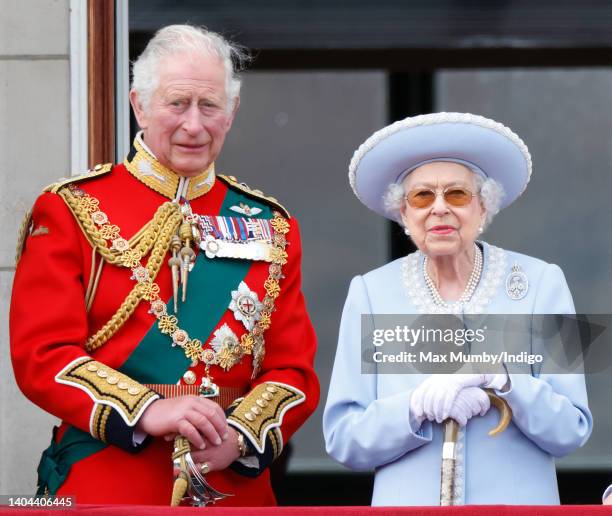 Prince Charles, Prince of Wales and Queen Elizabeth II watch a flypast from the balcony of Buckingham Palace during Trooping the Colour on June 2,...