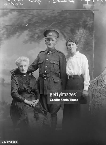 Portrait of an unidentified soldier and two unidentified women inscribed Banks, Berry & Co, photography studio, 1916- 1917, Wellington, Portrait of a...