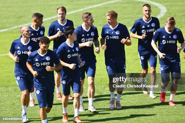 The team of Schalke with Sebastian Polter and Simon Terodde the training session at Parkstadion on June 22, 2022 in Gelsenkirchen, Germany. FC...