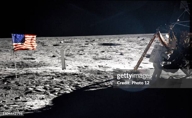 Astronaut Neil A. Armstrong, Apollo ll mission commander, at the modular equipment storage assembly of the Lunar Module 'Eagle' on the historic first...