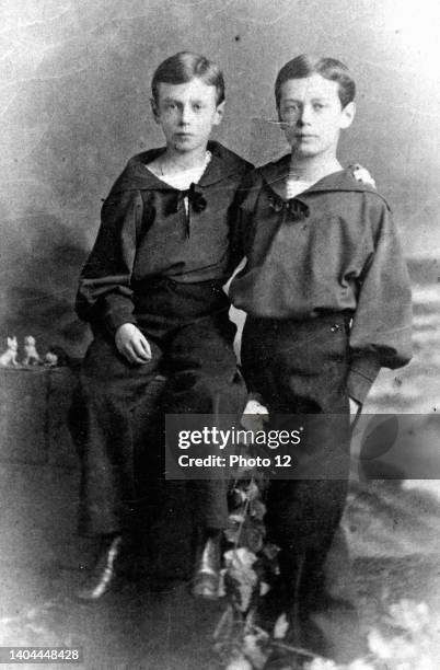 The future Nicholas II of Russia and his brother, Grand Duke George Alexandrovich .