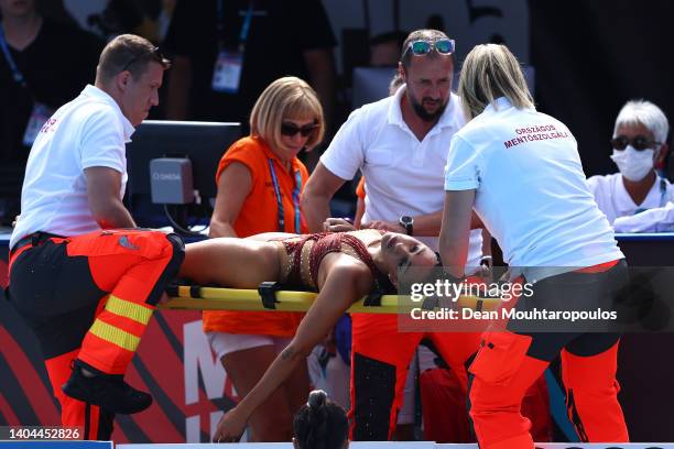 Anita Alvarez of Team United States is attended to by medical staff following her Women's Solo Free Final performance on day six of the Budapest 2022...