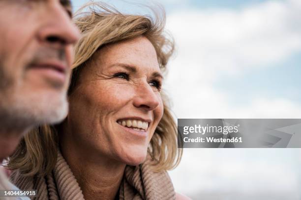 happy mature woman by man - contemplation couple stock pictures, royalty-free photos & images