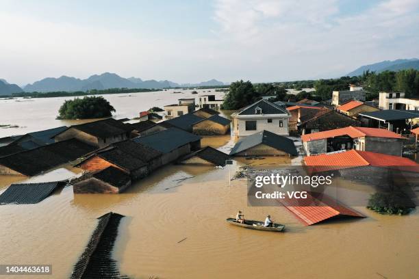 Aerial view of a flood-hit township after torrential rains on June 22, 2022 in Yingde, Qingyuan City, Guangdong Province of China. Flood control...