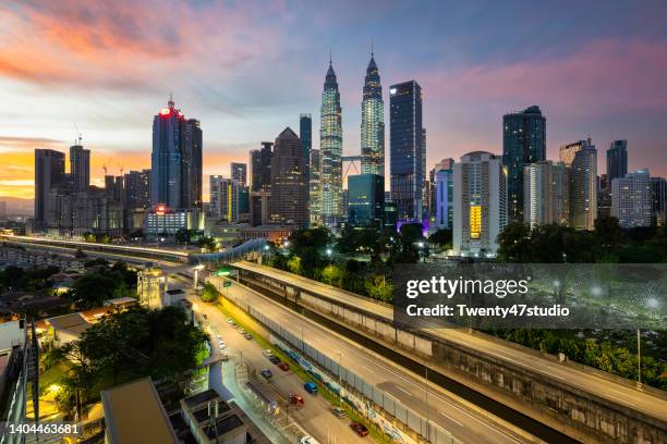 kuala lumpur city skyline view in morning - menara tower stock pictures, royalty-free photos & images