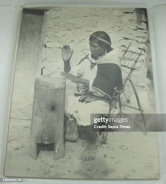 Huichol Indian Beating the Hollow-Log Drum, Huichol, Wixarika, Photograph, mounted on cardboard, 13 3/8 x 10 3/16 in., 34 x 25.9 cm.