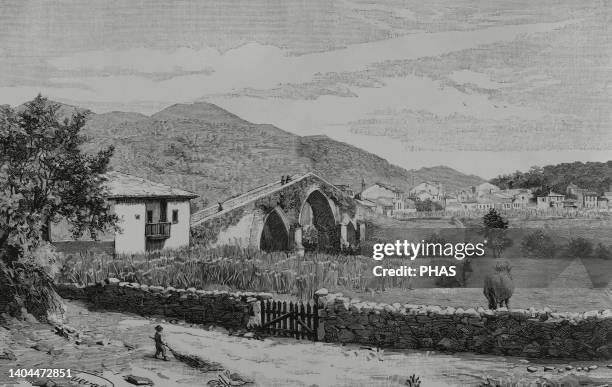 Spain, Asturias, Cangas de Onís. View of the so-called 'Roman Bridge', although its construction dates back to medieval times. Engraving. La...