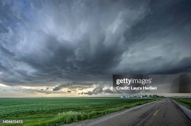 the road leading into the storm - supercell stockfoto's en -beelden