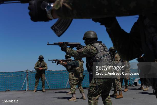 Romanian soldiers take part in the military excercise "Shield Protector 22" on board of King Ferdinand frigate in the Black Sea on June 22, 2022 in...