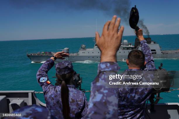 Romanian Navy soldiers on board of King Ferdinand frigate salute corvette RADM Eustatiu Sebastian, as they take part in the military excercise...