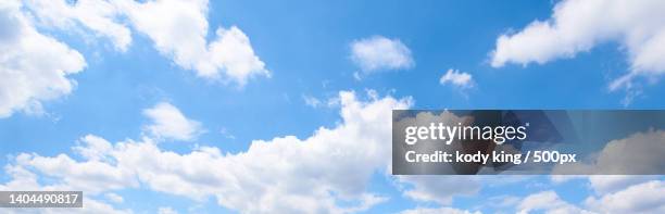 low angle view of clouds in sky - 背景 stock-fotos und bilder