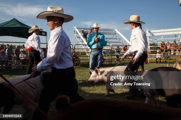 Youth show their 4H pigs at the Phillips County Fair in Dodson, Montana on August 2, 2018. The American Prairie Reserve , an independent, nonprofit...