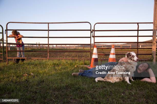 Aubri Werk with her dog on her family’s ranch on June 27, 2018 in Hays, Montana on the Belknap Indian Reservation. Her parents, Toby and Liz Werk,...