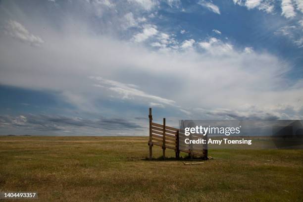 Cattle ramp stands in a pasture on the Fort Belknap Indian Reservation on June 28, 2018 in Central Montana.