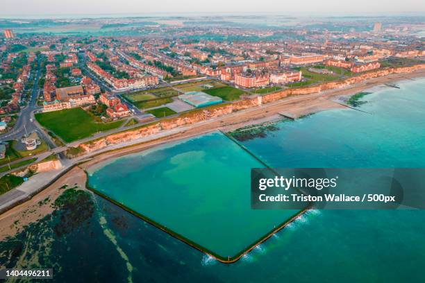 walpole bay tidal pool looking back towards margate,tidal pool margate,margate,united kingdom,uk - bay of water stock pictures, royalty-free photos & images