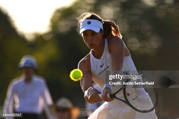 Mandy Minella of Luxembourg plays backhand against Maddison Inglis of Australia in their Womens' Qualifying Singles match during Day 3 of Wimbledon...