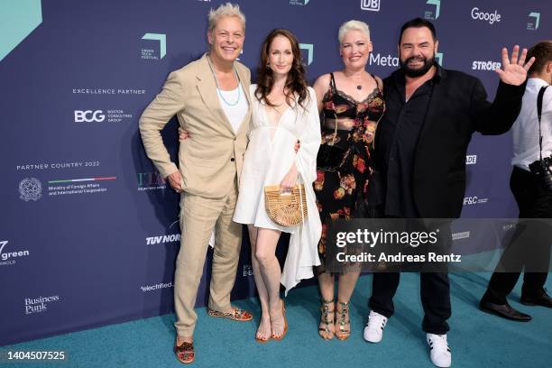 Uwe Fahrenkrog-Petersen, Christin Dechant, guest and Marian Goldattend the Green Awards during day 1 of the Greentech Festival on June 22, 2022 in...