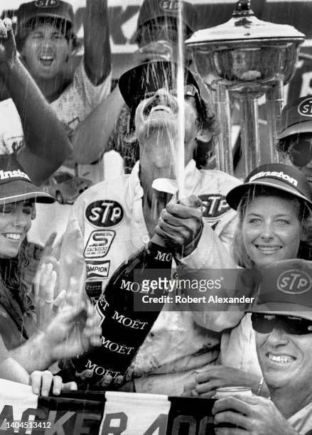 Driver Richard Petty celebrates winning the 1984 Firecracker 400 stock car race at Daytona International Speedway in Daytona Beach, Florida.