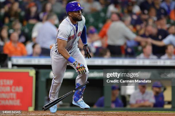 Starling Marte of the New York Mets hits an RBI double during the sixth inning against the Houston Astros at Minute Maid Park on June 22, 2022 in...