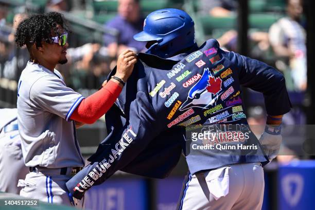 Teoscar Hernandez of the Toronto Blue Jays puts on the home run jacket after his two run home run in the seventh inning against the Chicago White Sox...