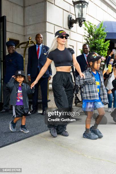 Psalm West, Kim Kardashian and Saint West are seen in Midtown on June 22, 2022 in New York City.