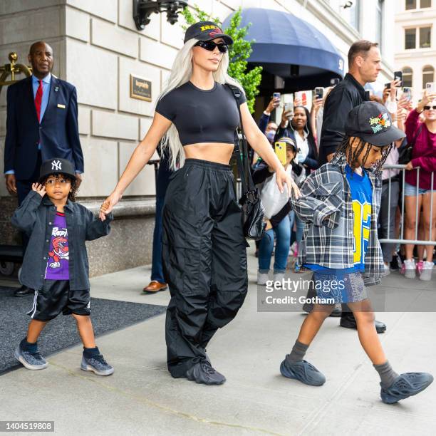 Psalm West, Kim Kardashian and Saint West are seen in Midtown on June 22, 2022 in New York City.