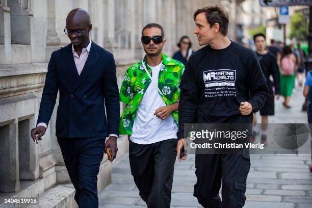 Guests seen outside Lemaire during Paris Fashion Week - Menswear Spring/Summer 2023 on June 22, 2022 in Paris, France.
